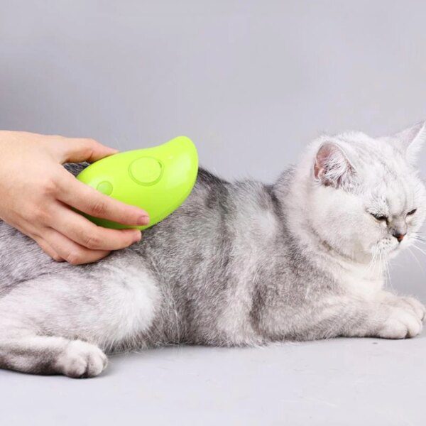 56126-onthhb.jpg Electric Cat Grooming Brush: Soft Silicone, Steam Spray