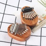 Wooden Mini Thumb Piano: Portable 8-Tone Musical Toy for Beginners