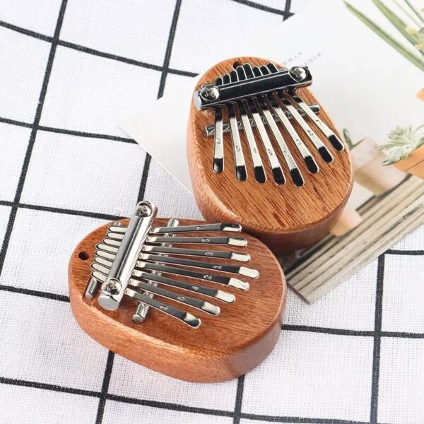 Wooden Mini Thumb Piano: Portable 8-Tone Musical Toy for Beginners